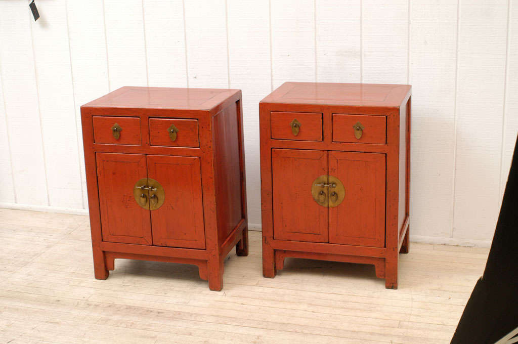 Pair of Chinese Red Lacquer Square Cornered Bedside Chests with Two Drawers and Interior Shelf.