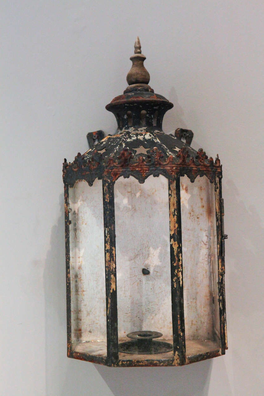 A pair of glass and iron wall lanterns from Sweden.
Sold only as a pair.