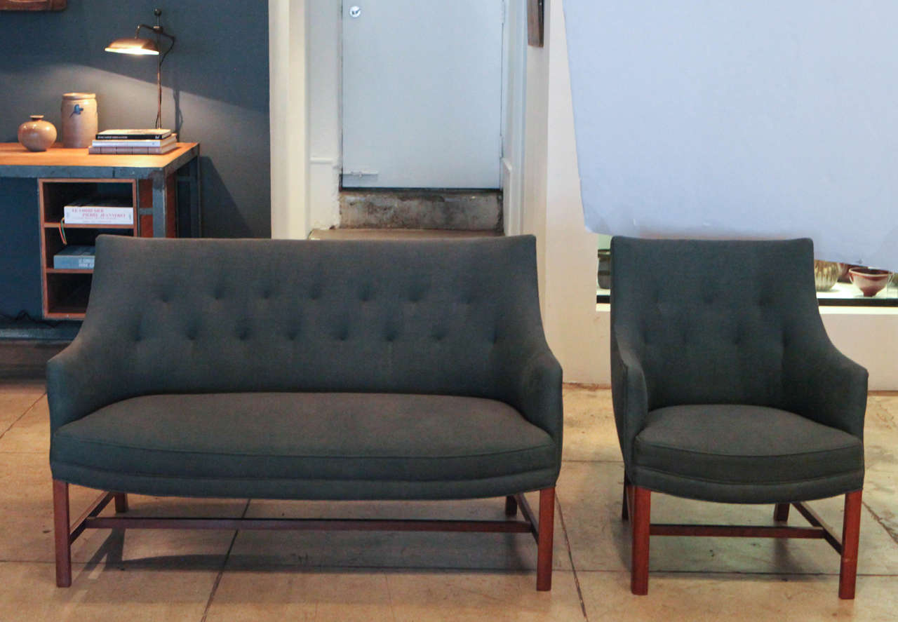Re-upholstered in dark de la cuona linen and original mahogany frames.
Sold only as a set.

Chair measurement - ht 30.5 seat ht 15.5 width 23.75 depth 27.5.
Loveseat measurements below.