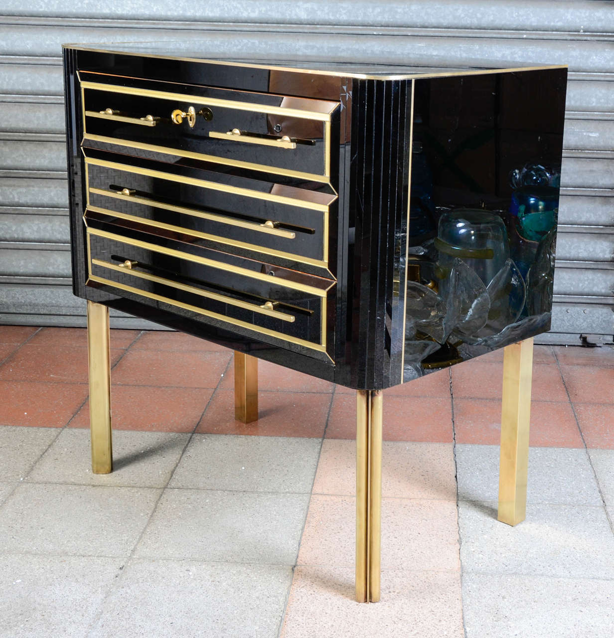 Brass Pair of Chests with Three Drawers Covered in Black Mirror, circa 1970
