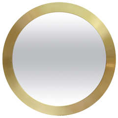 Round Mirror Surrounded with Brass