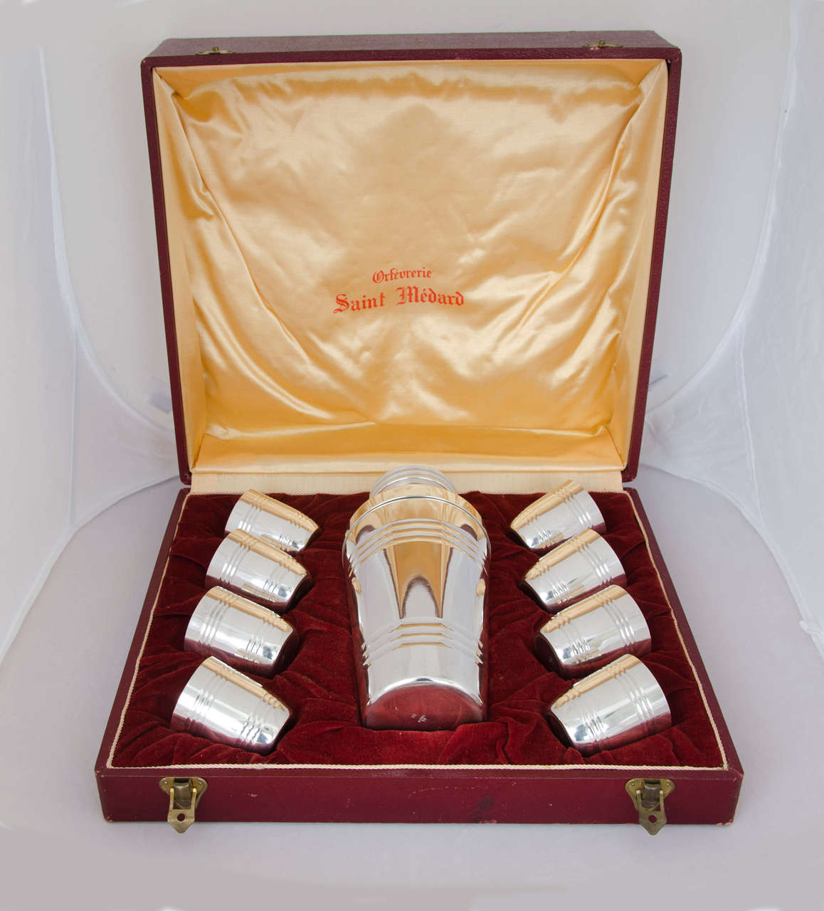 An Art Deco Cocktail Shaker and 8 Cups in an original fitted case. The set is silver-plated and made by Saint Medard of Picardy in France, circa 1935.
The height of the shaker is 22.8cms.