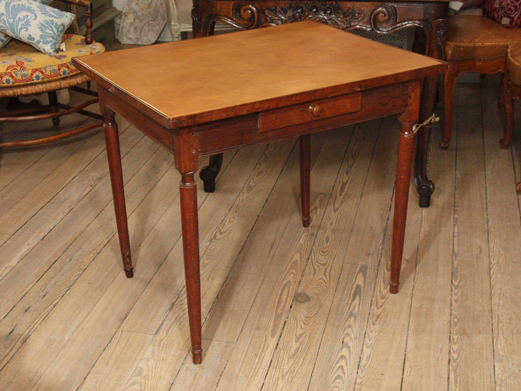 Directoire walnut side table or wrting desk.  Caramel colored leather top.