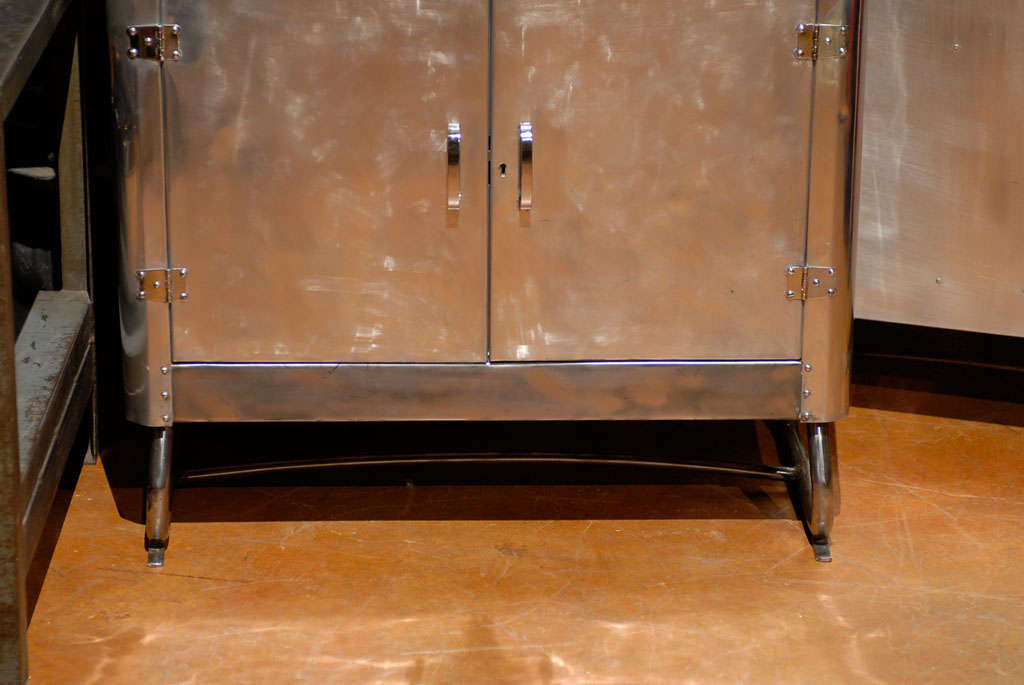 1950s English Polished Aluminum Glass Door Cabinet with Drawer and Lower Doors In Good Condition In Atlanta, GA