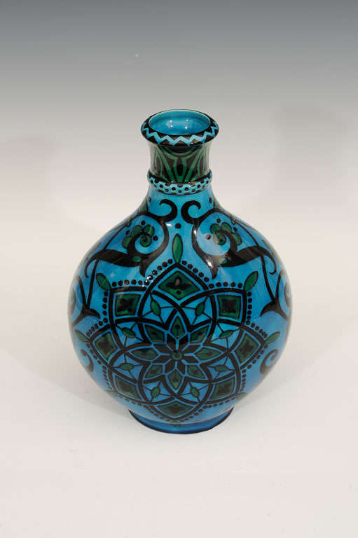 Striking turquoise and black ceramic vase created in baluster form during the 1920s by listed French ceramicist Paul Milet for Sevres, France. The vase bears the MP Sevres insignia indicating the work of Paul Milet on its base. The signature L.