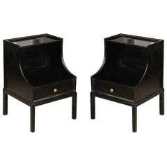 Pair of black lacquered nightstands by Tommi Parzinger , c. 1960