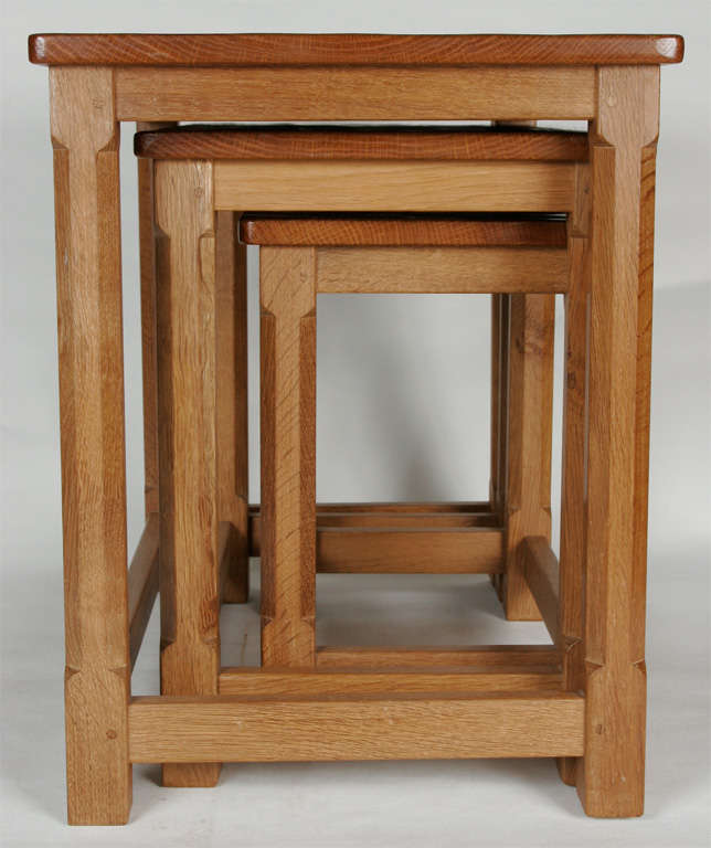A Robert 'Mouseman' Thompson Oak nest of tables. at 1stDibs