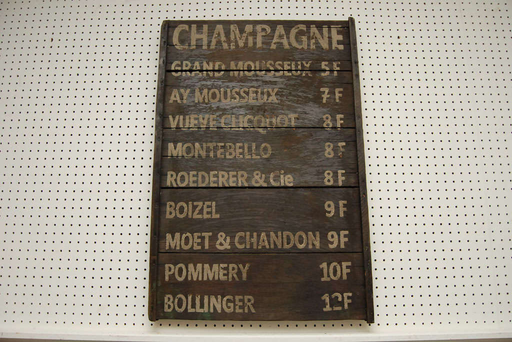 This is the perfect gift for a champagne lover. An old champagne menu with the best of the bests listed and at a steal. Well, 19th century steal. This sign is on very early boards with a simple vertical frame. the champagnes are listed clearly in