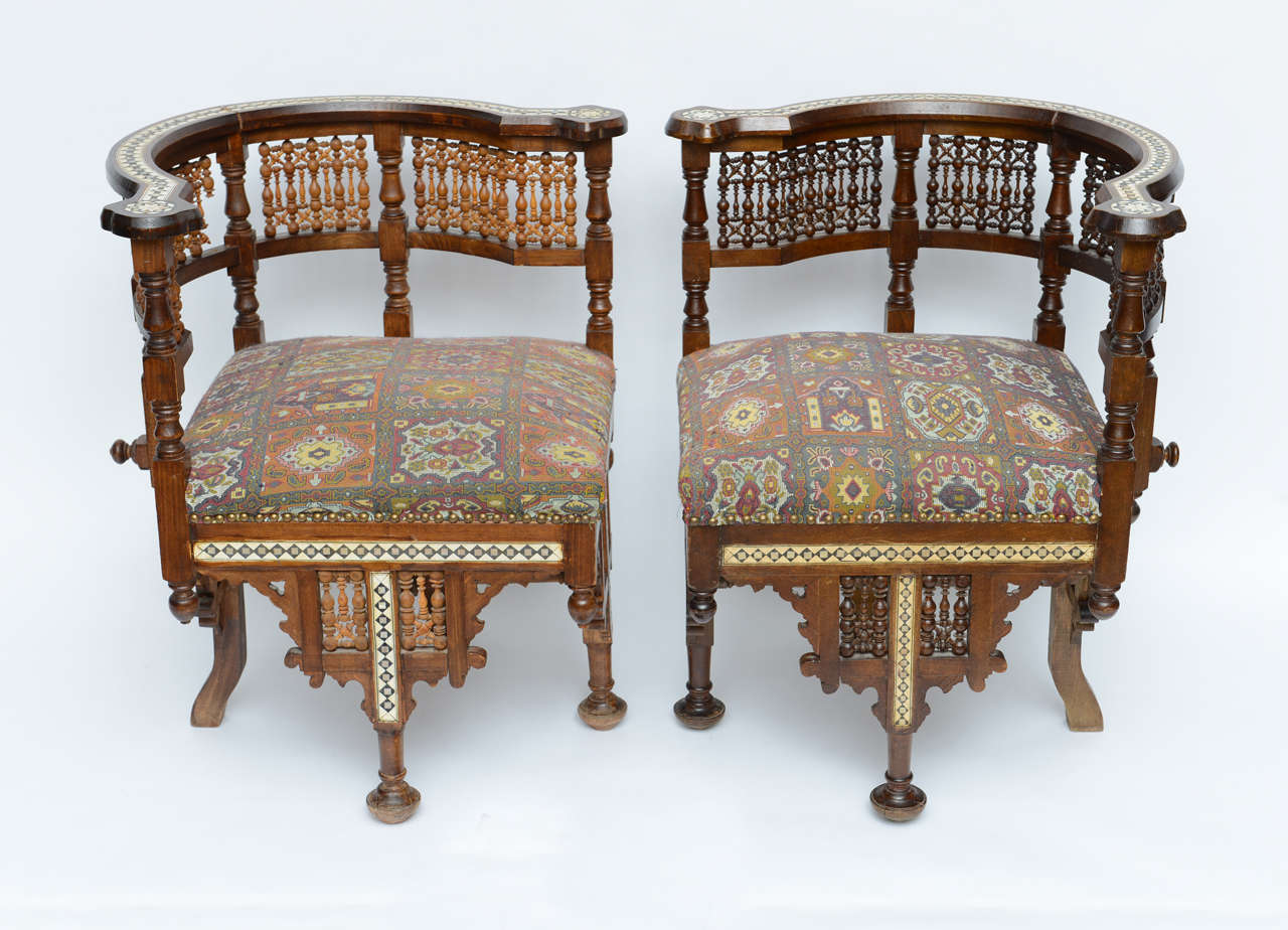 Pair of Moroccan Arm Chairs with Bone & Ivory Inlays, maybe used as a tete-a-tete (where chairs are positioned where you face one another).  Side table available could be used between the two depending on your room arrangement, also available is a