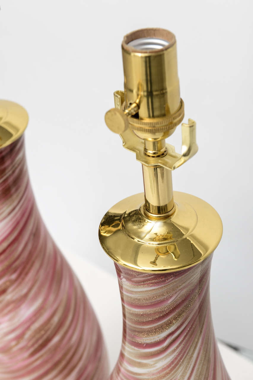 Mid-20th Century Pair of pink swirl Murano glass lamps