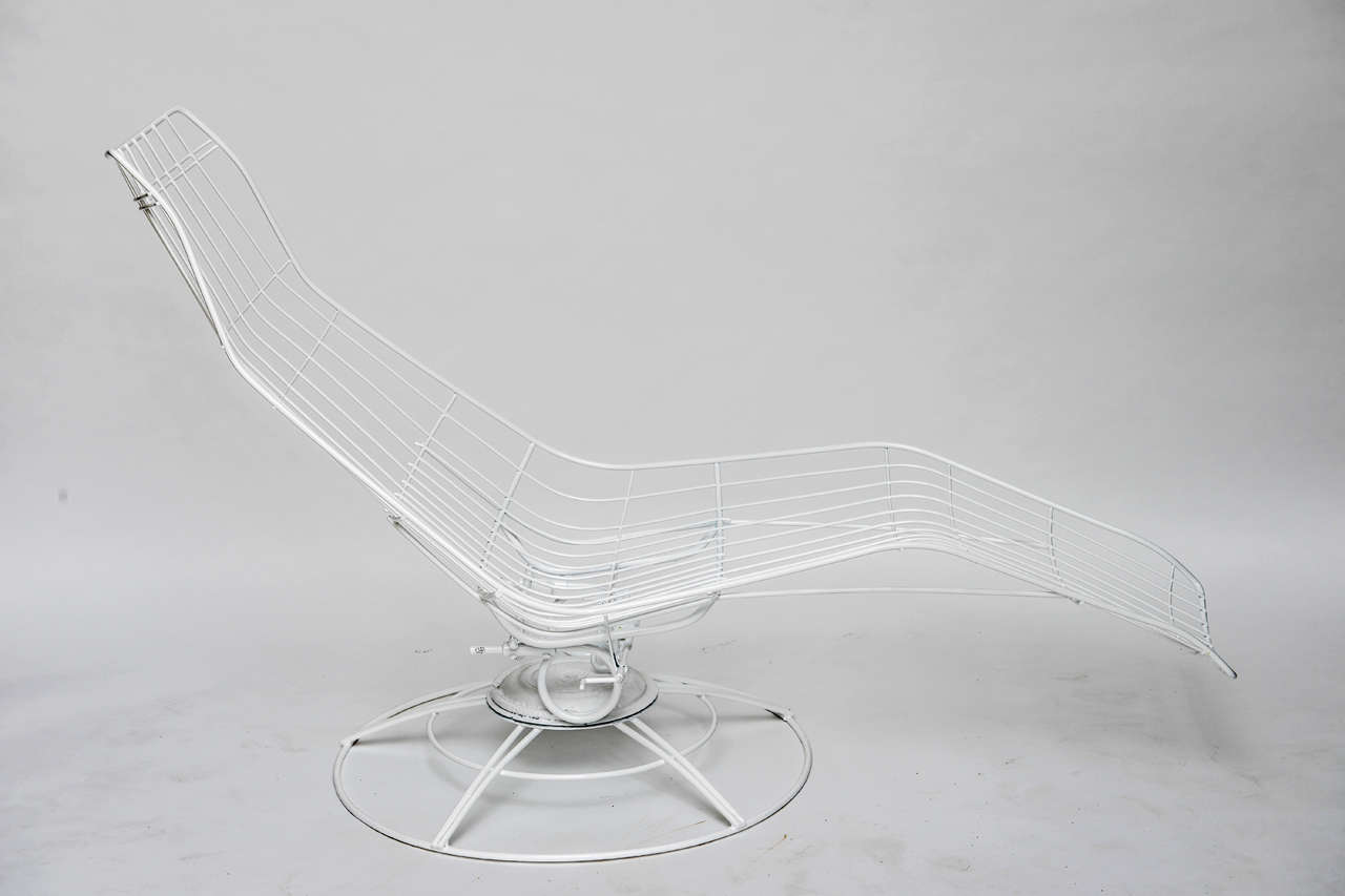 Pair of Mid Century coil tension wire chaises.  Chaises have been powder coated and are ready to lounge poolside or in a cabana.