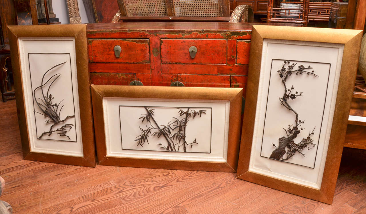 Framed 19th century Qing dynasty iron florals (two available, priced and sold separately).