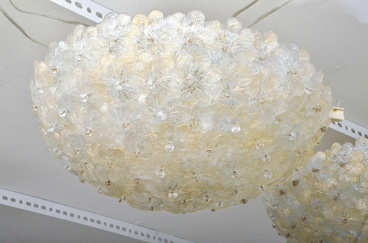 Beautiful clear and pale gold Murano glass flowers cover this flush mount ceiling fixture.