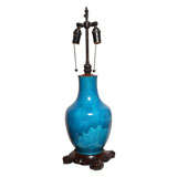 An Antique Aqua Glazed Chinese Vase Mounted as a Lamp.