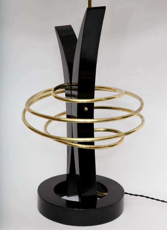 A 1950's Sculptural brass and black lacquer Table Lamp