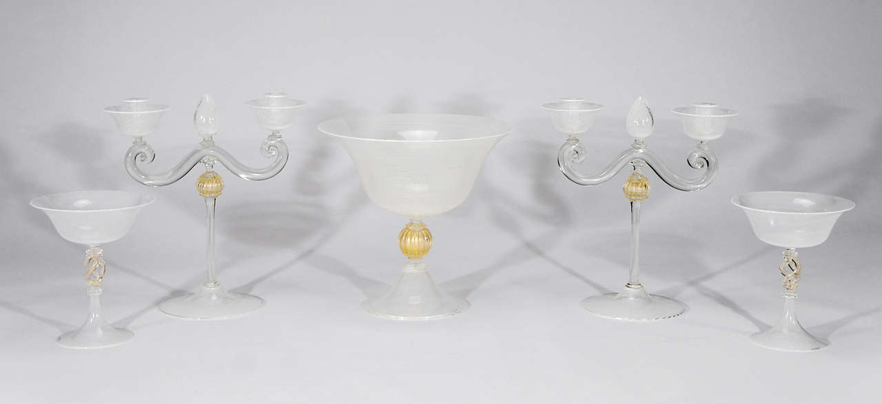 An impressive 5 pieces set of signed Cenedese console set or table centerpieces. The workmanship is outstanding and the hand blown white threading is very well matched and internally decorated with gold leaf connectors. The two-light candlesticks