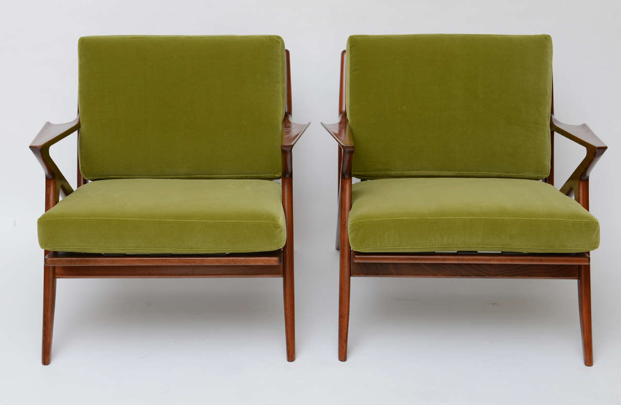 ...SOLD...One exceptional and iconic mid-century Poul Jensen designed chair for Selig.  Beautifully restored finish, new velvet upholstered cushions and new Fagas straps from Denmark.  Pictures show two, one available.

Measurements:
30