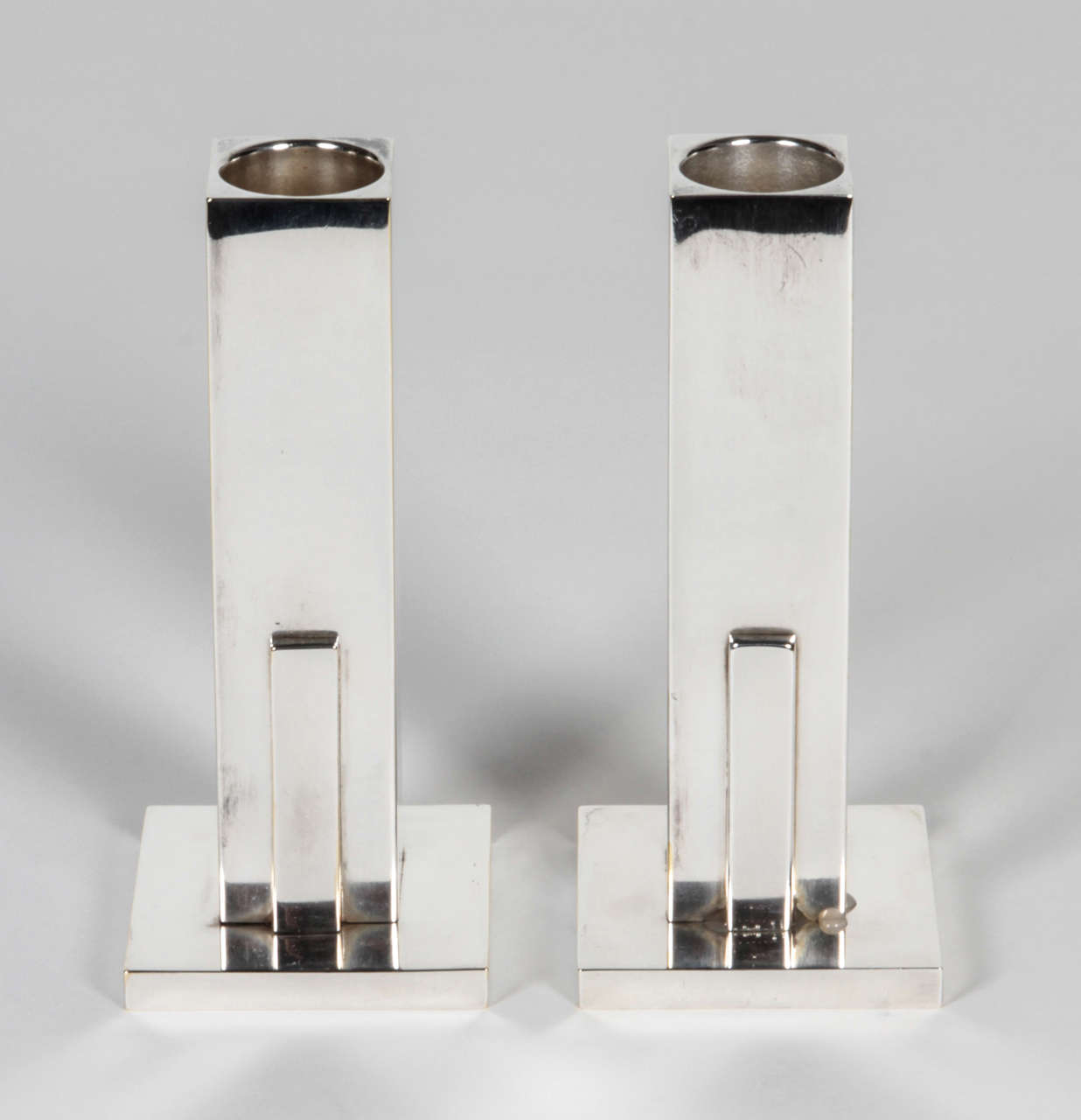 MERLE F. FABER   USA

Pair of “Skyscraper” candlesticks  c.1935-40

Silver-plated metal in a geometric stepped Modernist 