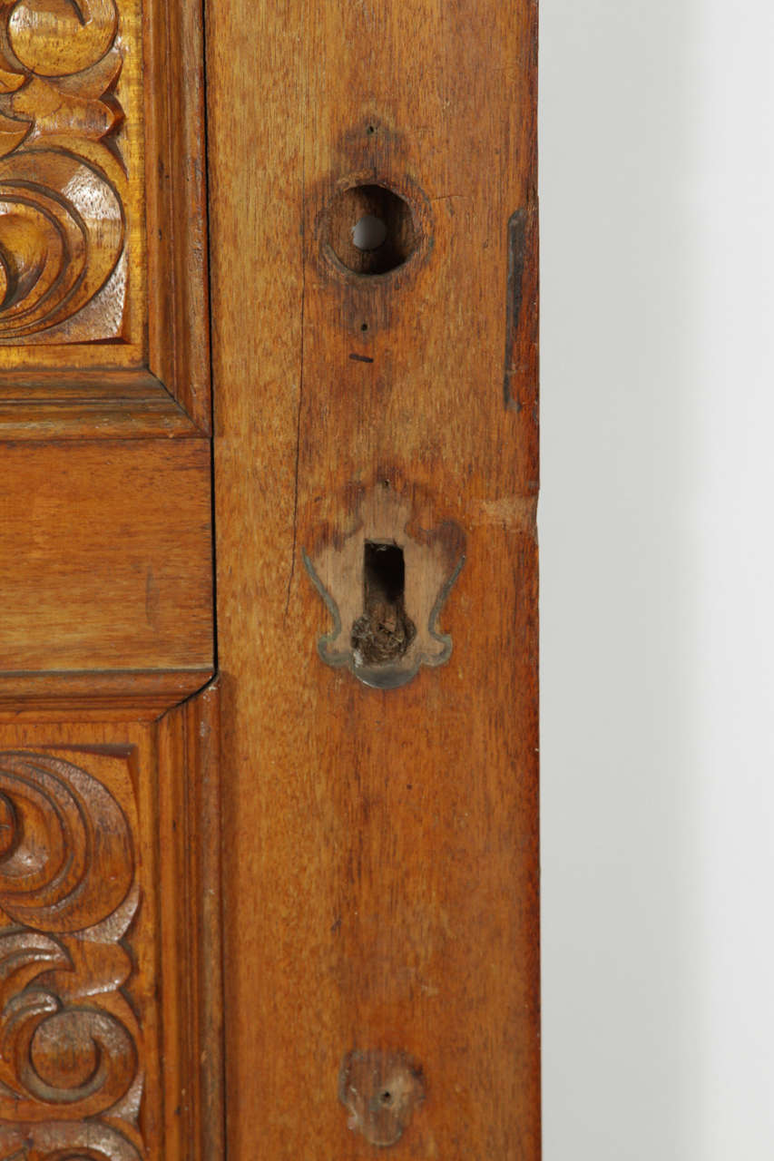 Carved Wooden Spanish Style Entry Door with Bronze Doorknocker In Excellent Condition In Los Angeles, CA