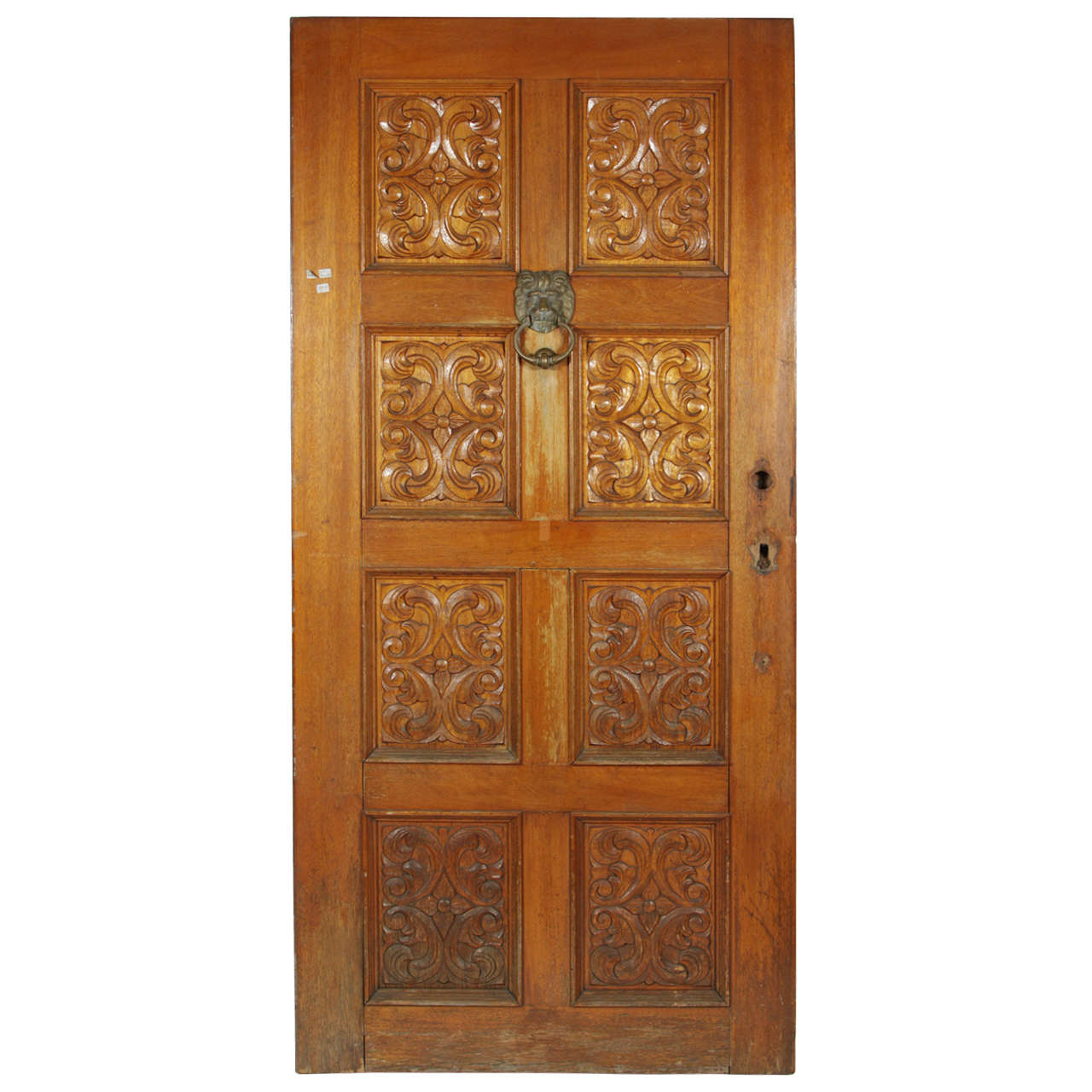Carved Wooden Spanish Style Entry Door with Bronze Doorknocker