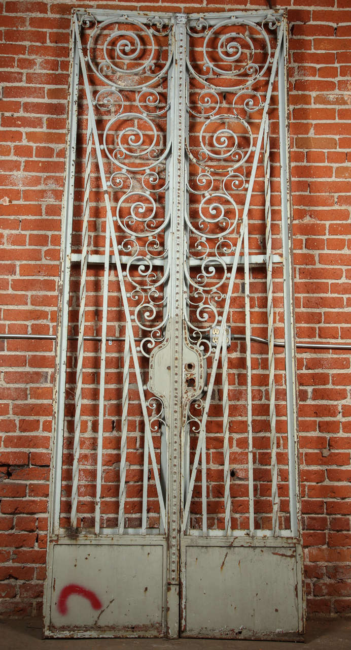 Large height but narrow size. Wrought iron with welded panels and frame garden gate set.