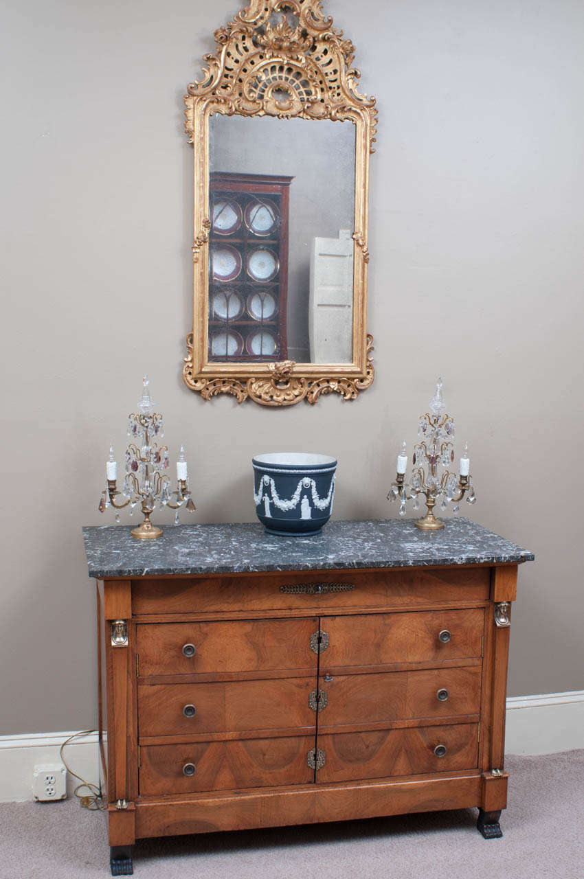 Outstanding marble-top over some of the most beautiful burled wood we have ever seen. This second Empire chest has one drawer over two doors; the doors were originally drawer fronts and were converted about 100 years ago. All the brass fittings are