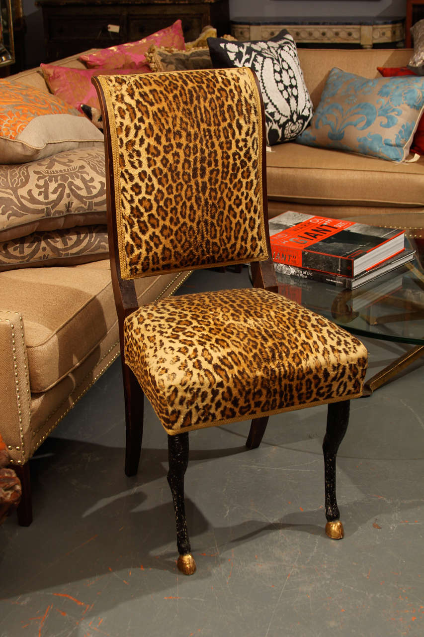 French side chair in faux leopard.  Sturdy, lovely. very nice wear