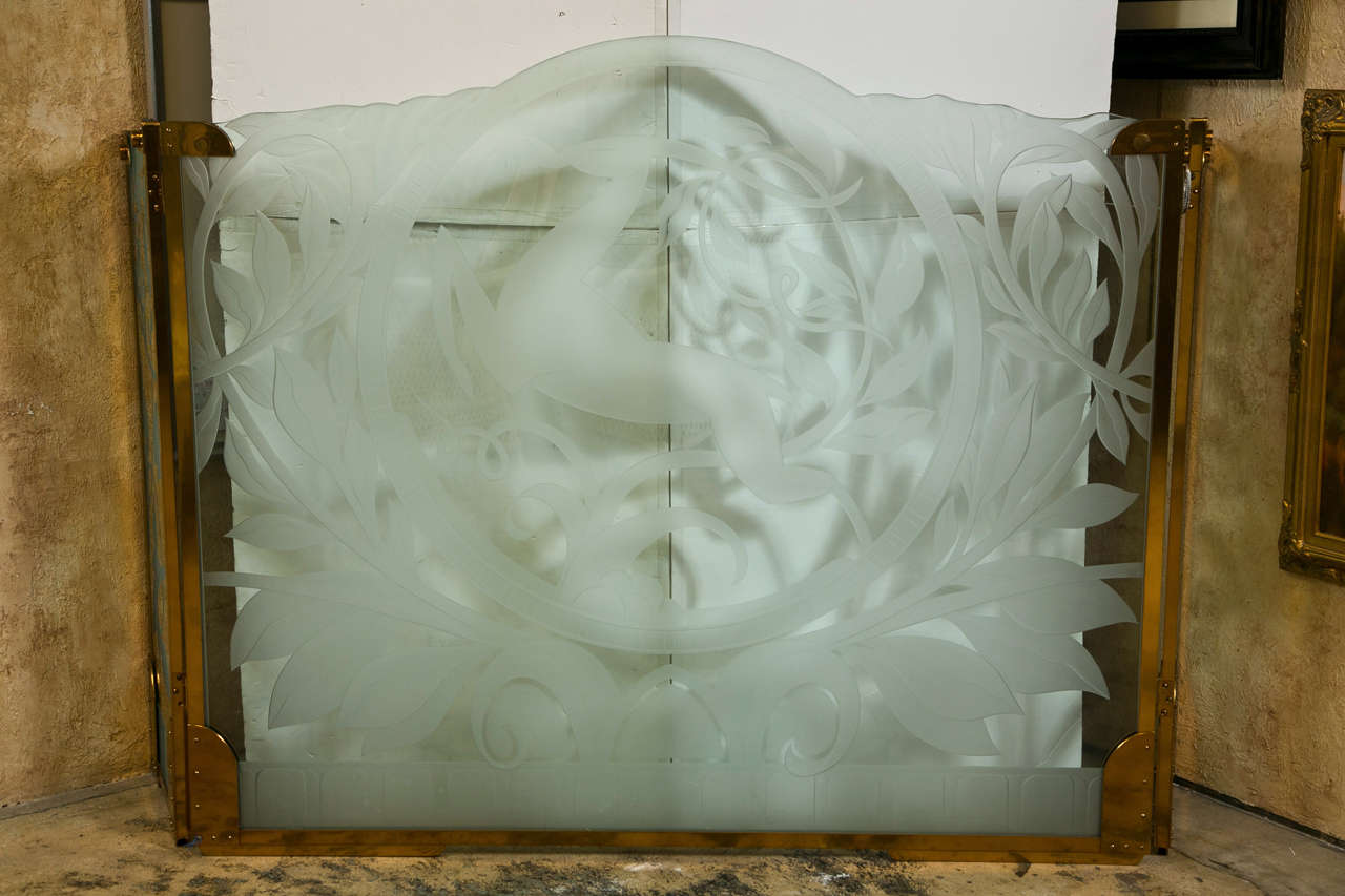 This glamorous, exclusive, one of a kind, rare Art Deco etched glass panel unit is  a work by the designer and artist, Dennis Abbe. Abbe founded the Art Deco Society in New York.  His spectacular works of art were created from the 1960's through the