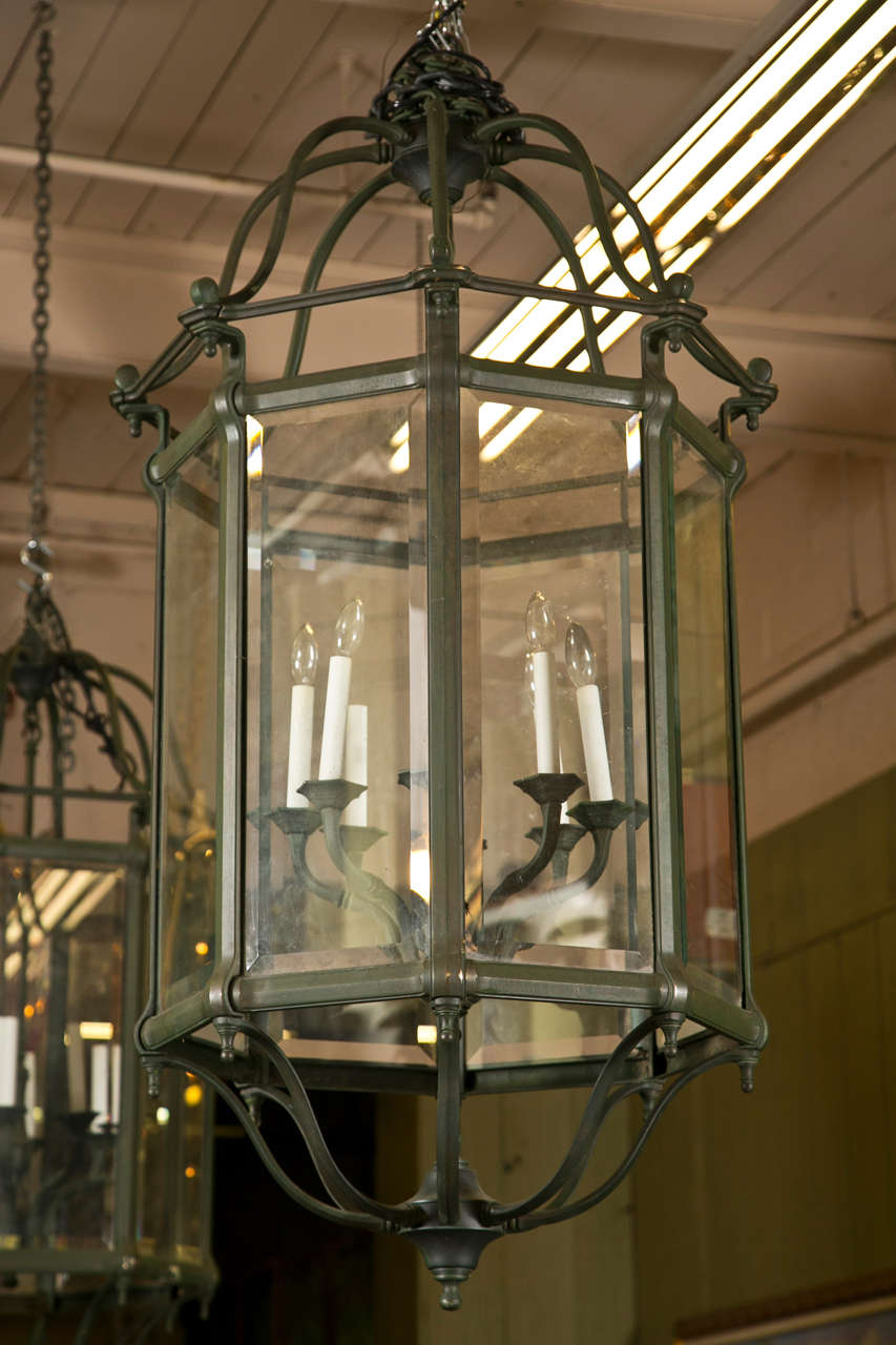 Vintage lovers will adore these glittering glass lantern chandeliers.  It borrows its styling from the past with its large lantern-shape. The lighting reflects the quality of the craftsmanship these lanterns. They are octagon shaped.  Each with