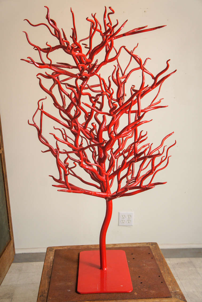 pair of wrought iron trees - red enamel finish - possibly simulating red coral - found 30 years ago in an antiques shop - no signature