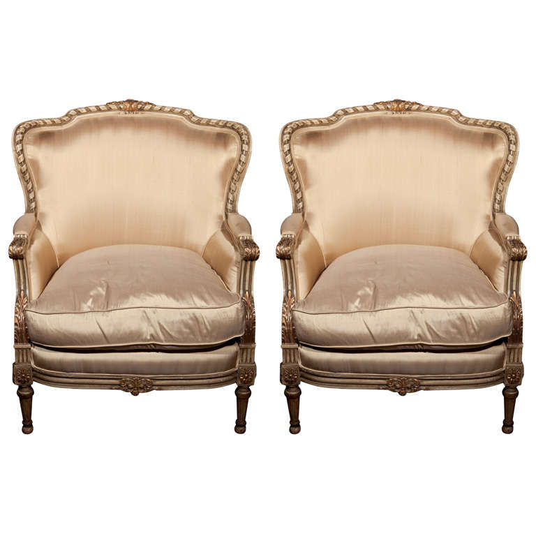 Pair of French Louis XVI Style Bergere Chairs in Fine Painted and Gilt Finish
