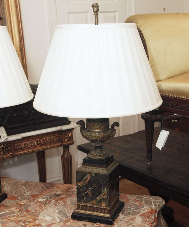 Pair of 19th century urns on faux marble plinths now as lamps