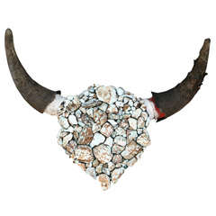 Old Buffalo Skull Covered in Chunks of Raw Turquoise