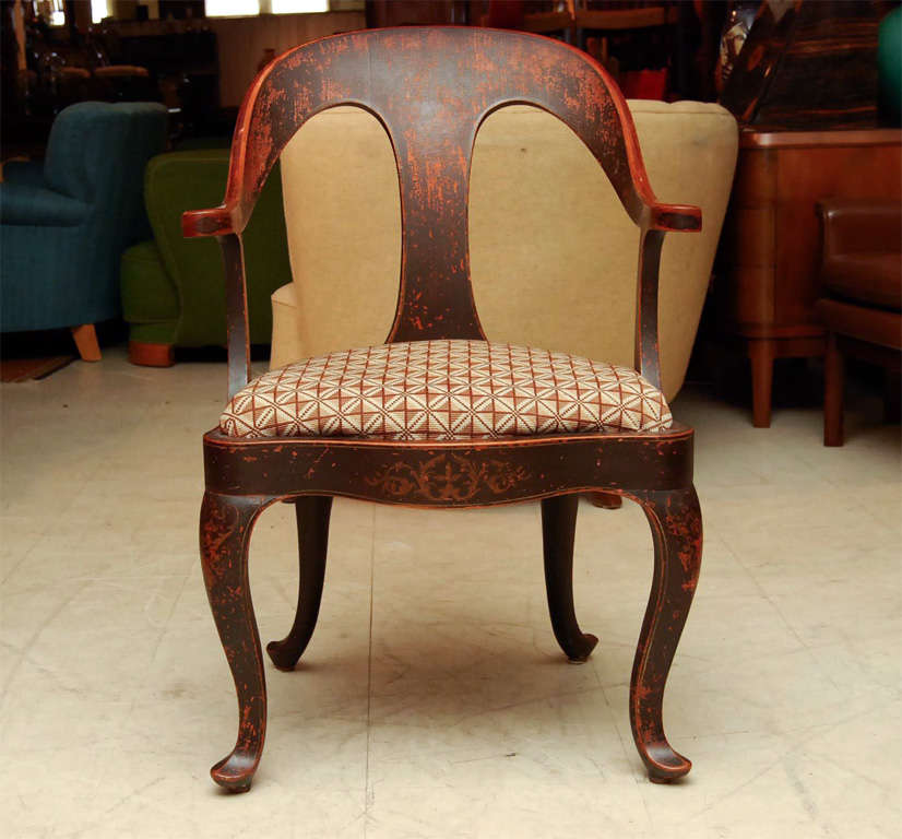 Spoon-back armchair, late 19th century, decorated,  old red paint, cabriole legs and drop in upholstered seat, embroidered.