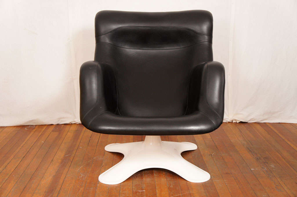 A YRJÖ KUKKAPURO 'KARUSELLI' LOUNGE CHAIR 
Designed in 1964
for Haimi, white fibreglass, chrome-plated steel, leather upholstery 
35in. (86cm.) high; 30½in. (77cm.) wide
excellent condition