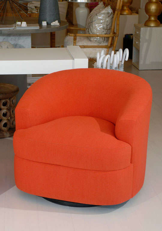 Pair of Orange Swivel Chairs 1