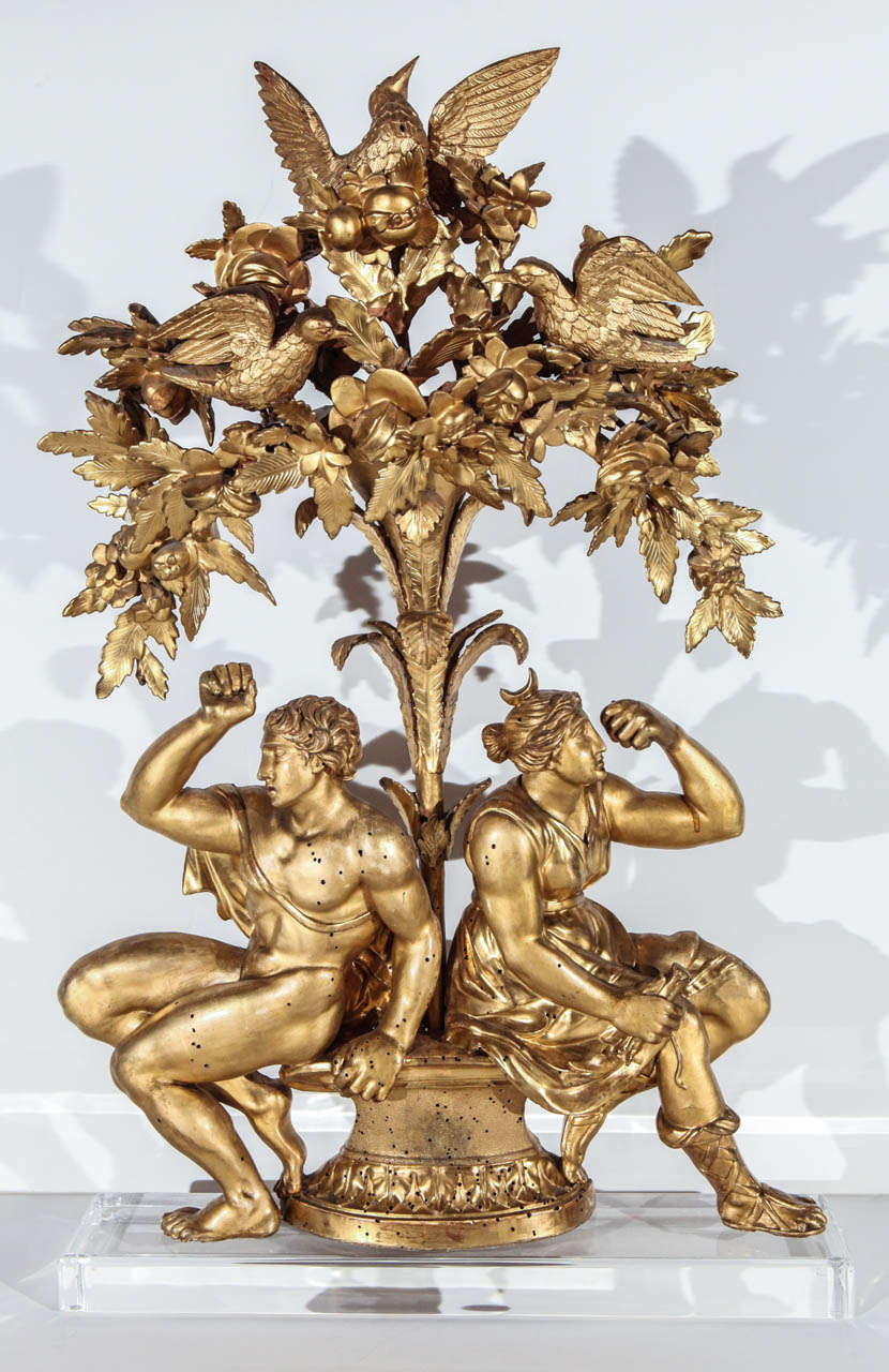 Hand carved and 22k, gold gilded, sculpture of the Tree of Life with figures mounted on a custom, Lucite base. Originally part of a frieze that ran the length of a room in an Italian villa.