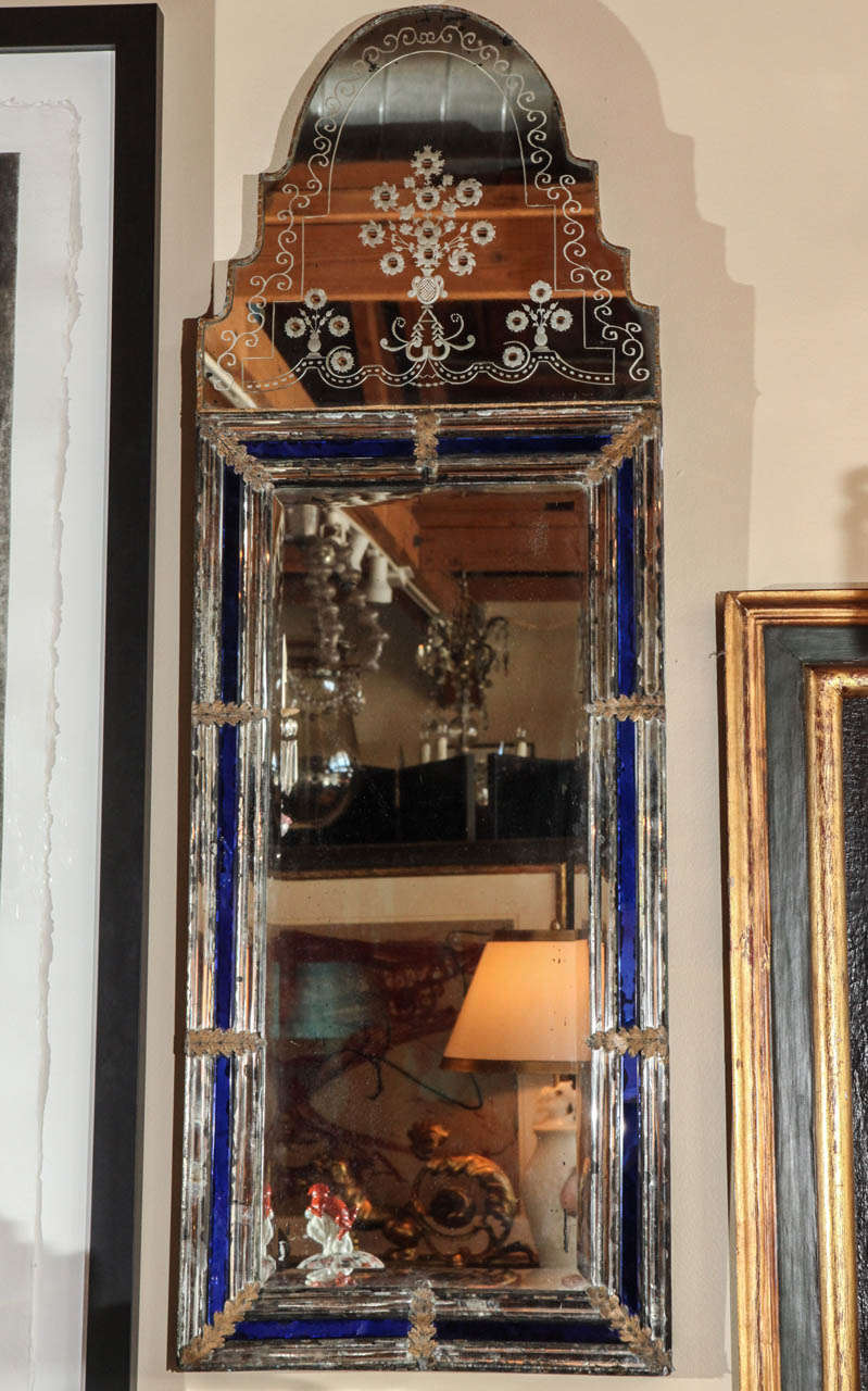 Pair of hand-etched, beveled, Gustavian, mirrors with sapphire-glass accents and floral motifs.