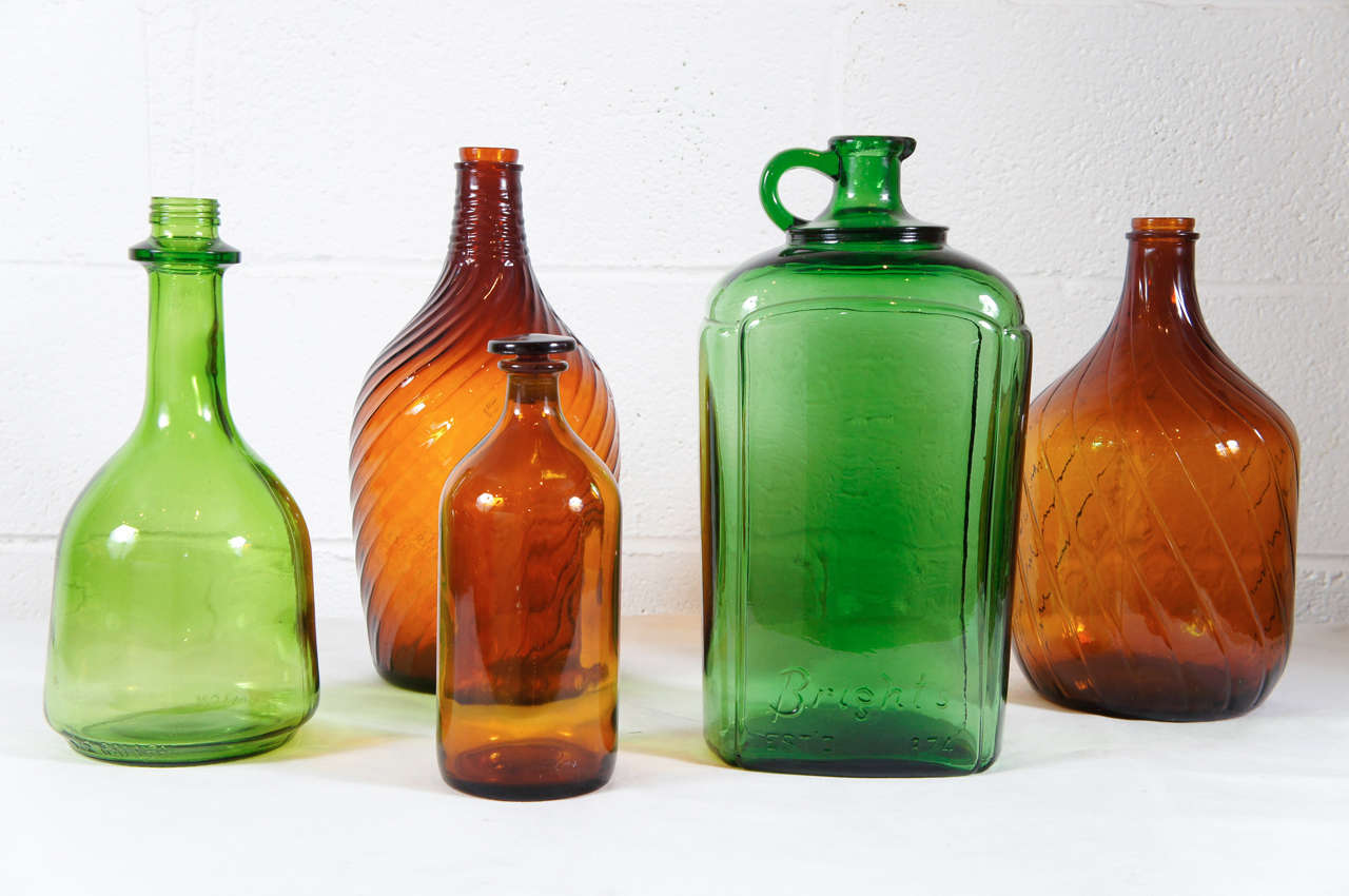 Unknown An Assortment of Green and Brown Bottles For Sale