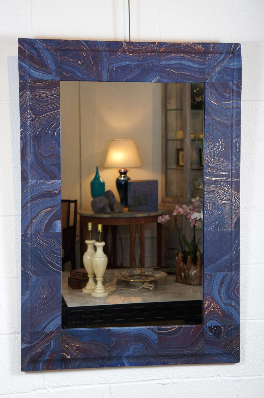 Here is a unique decoupage mirror in a blue and gold marbleized paper.