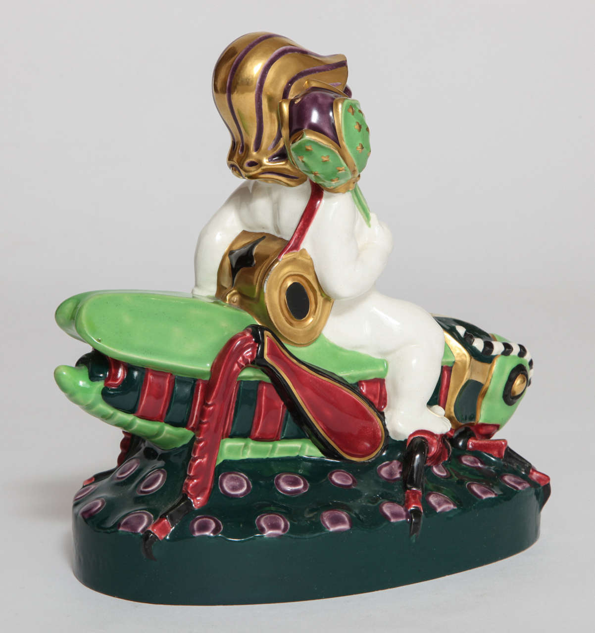 Serapis Wahliss Fayence  Secessionist Putto on a Grasshopper, Austria circa 1910 In Excellent Condition For Sale In New York, NY