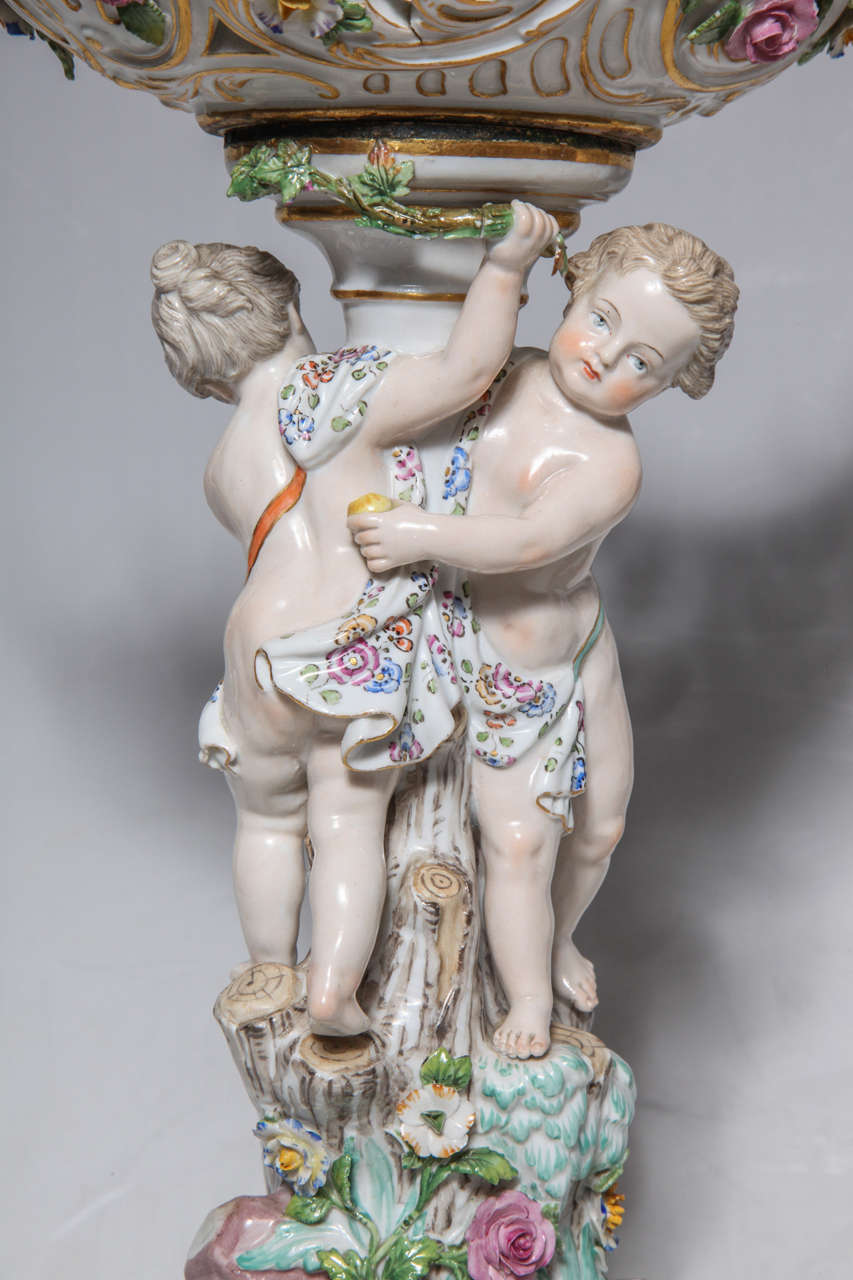 German Pair of 19th Century Meissen Porcelain Cupid Centerpieces with Baskets For Sale