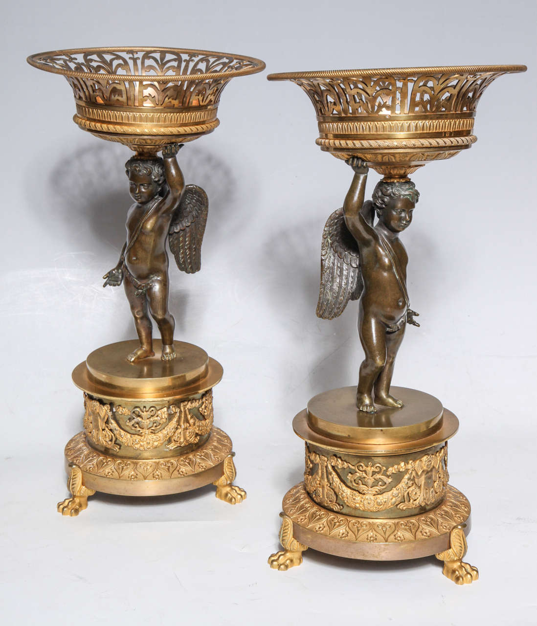 Pair of Russian Empire Period Gilt and Patinated Bronze Cupid Centrepieces In Excellent Condition In New York, NY