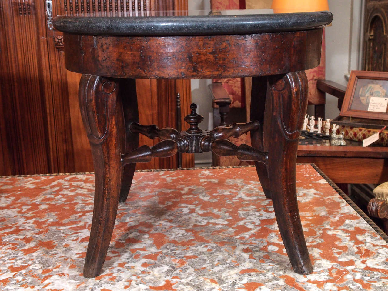 Circular, Walnut Saber Leg Table