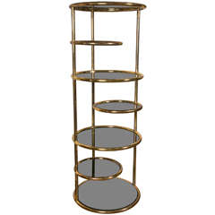 Vintage An unusual etagere or desserte, attributed to Pace.
