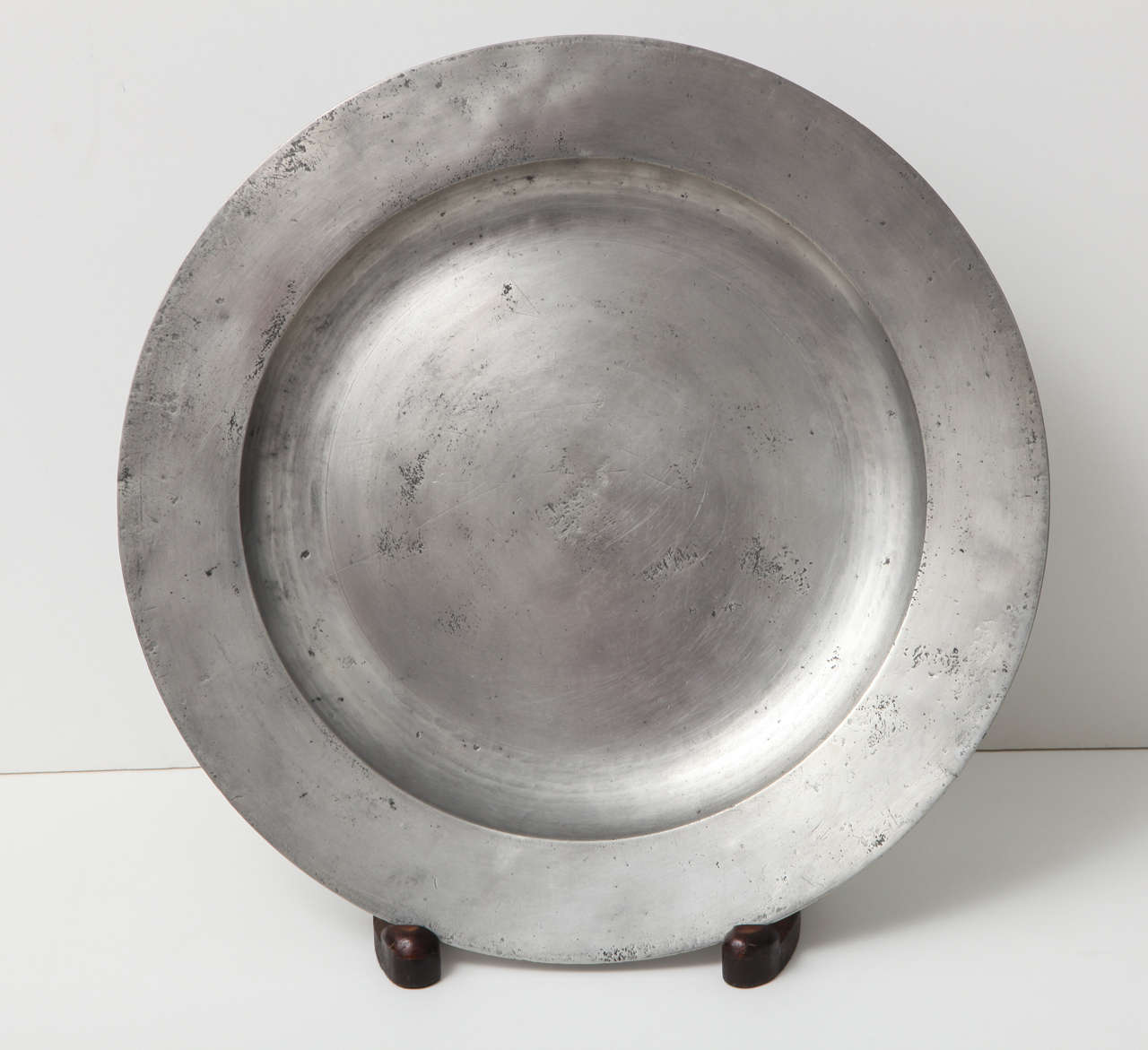 An unusually large 18th century English pewter charger
circa 1730