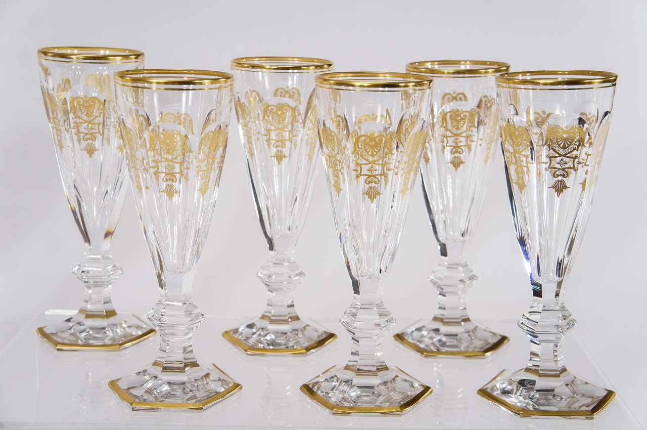 An extraordinary set of 18 handblown, signed Baccarat crystal champagne flutes await your next celebration. The elegant Harcourt 