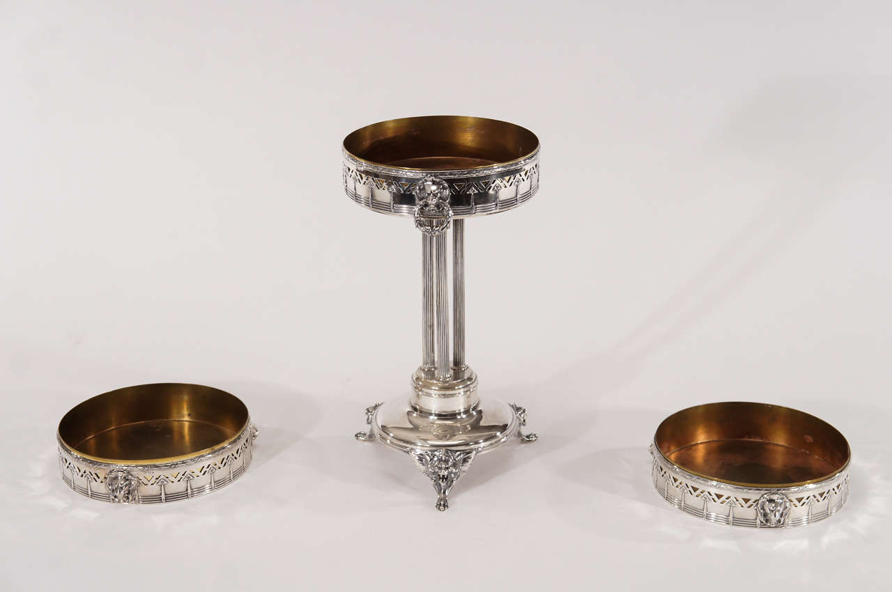 This three-piece set is both practical and unusual. Consisting of a tall center piece and two low ones, the guests are never obscured by the decorations. Each piece retains the original brass liners which are removable for easy cleaning. These can