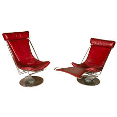 Pair of Stainless Steel and Red Leather Armchairs