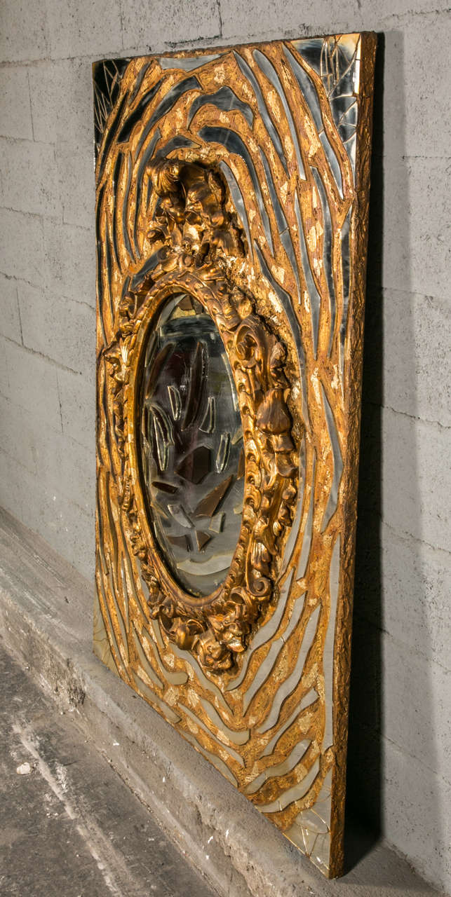 mirrors pannel,decorative art,1970,in the center there is a 19th century gilt wood frame,the name of the artist is Jean Claude Mazeran